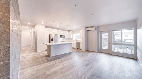 Interior kitchen island open to the living room