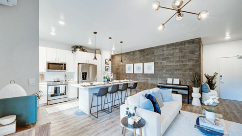 interior living room open to kitchen and large central island