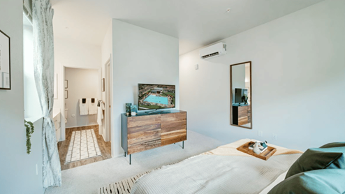 Interior bedroom open to bathroom