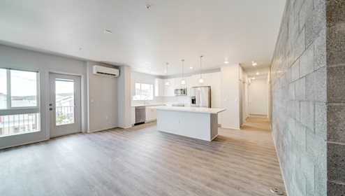 Interior kitchen island open to the living room