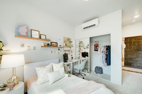 Interior bedroom with full length door mirrors
