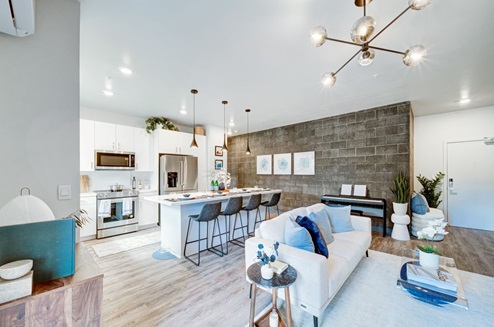 interior Livingroom open to kitchen with bar stools
