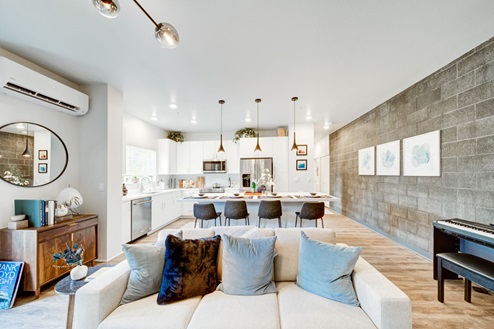 interior Livingroom open to kitchen with bar stools