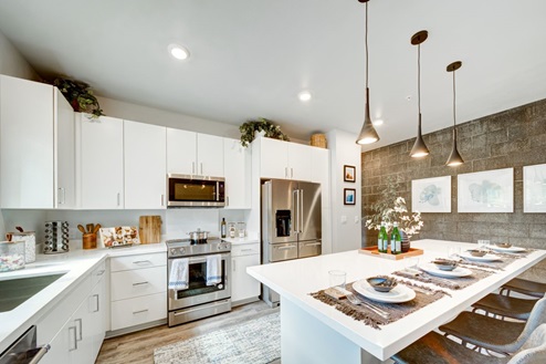 Interior white kitchen with central island