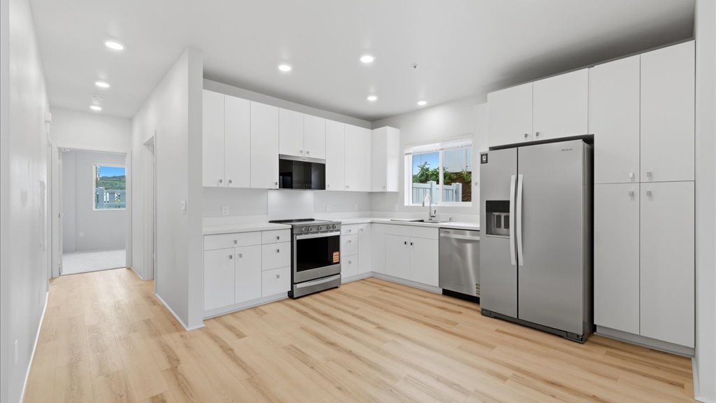 Interior kitchen open to living room