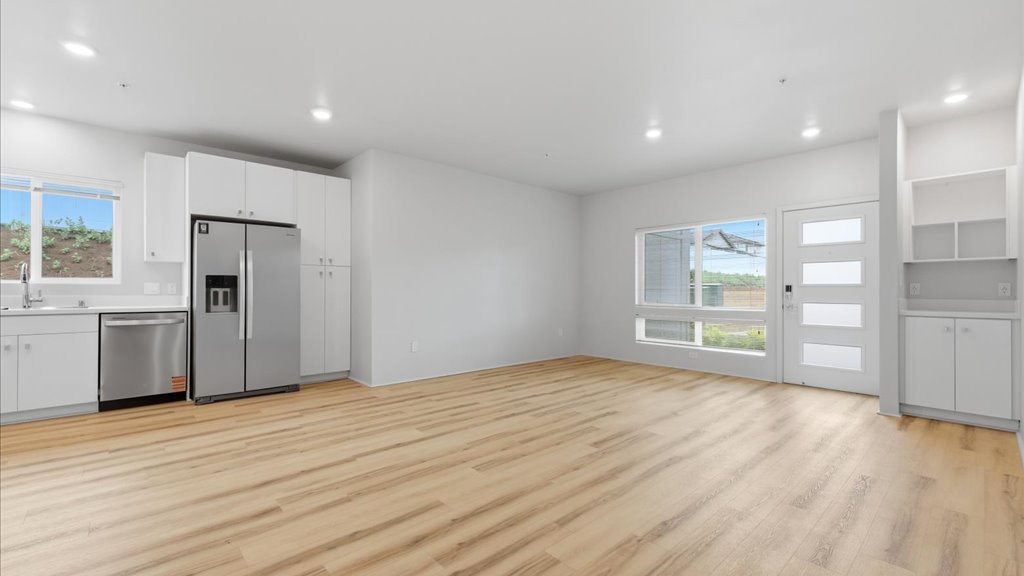 Interior kitchen open to living room