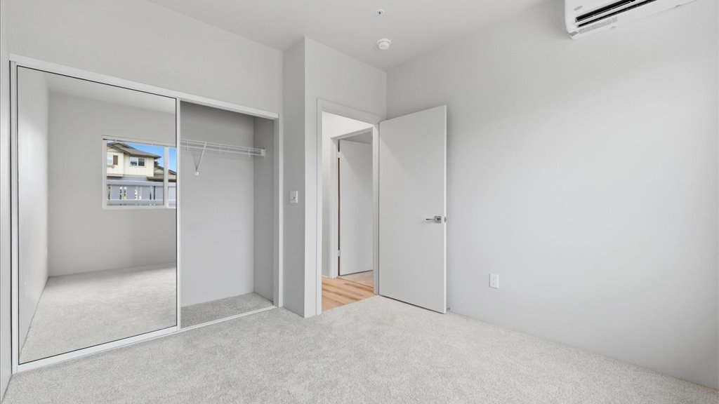 Interior bedroom with sliding door closet
