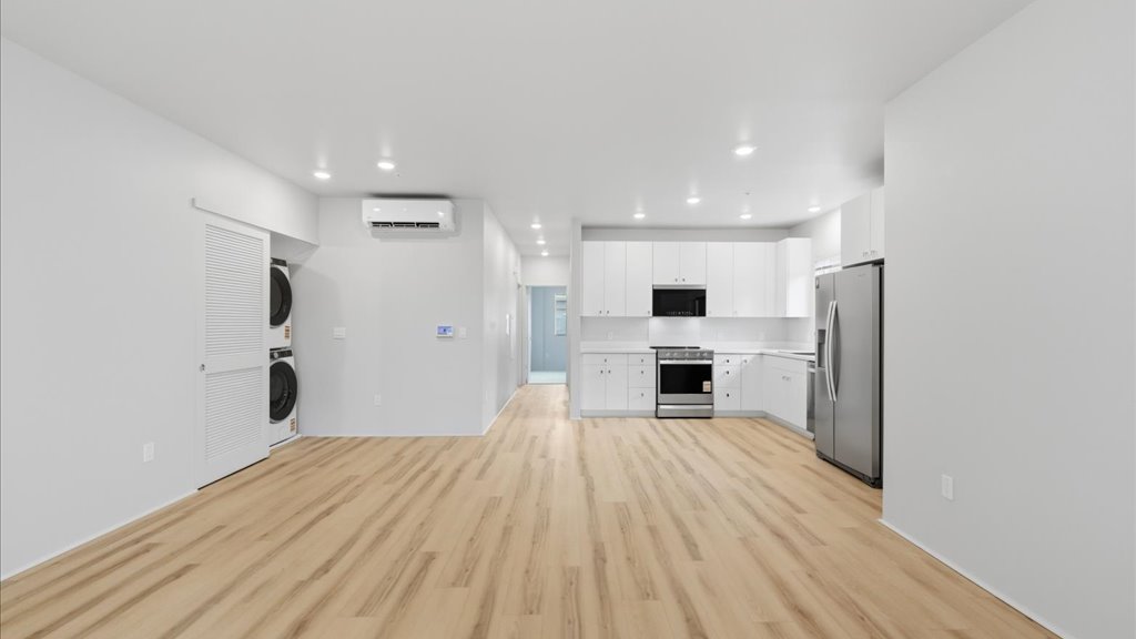 Interior kitchen open to living room