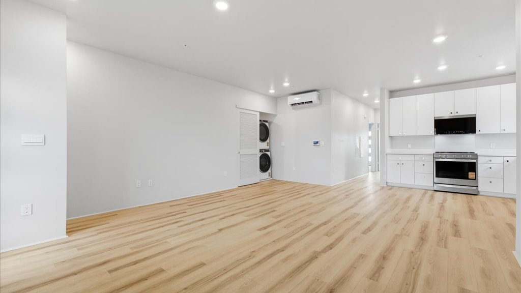 Interior kitchen open to living room