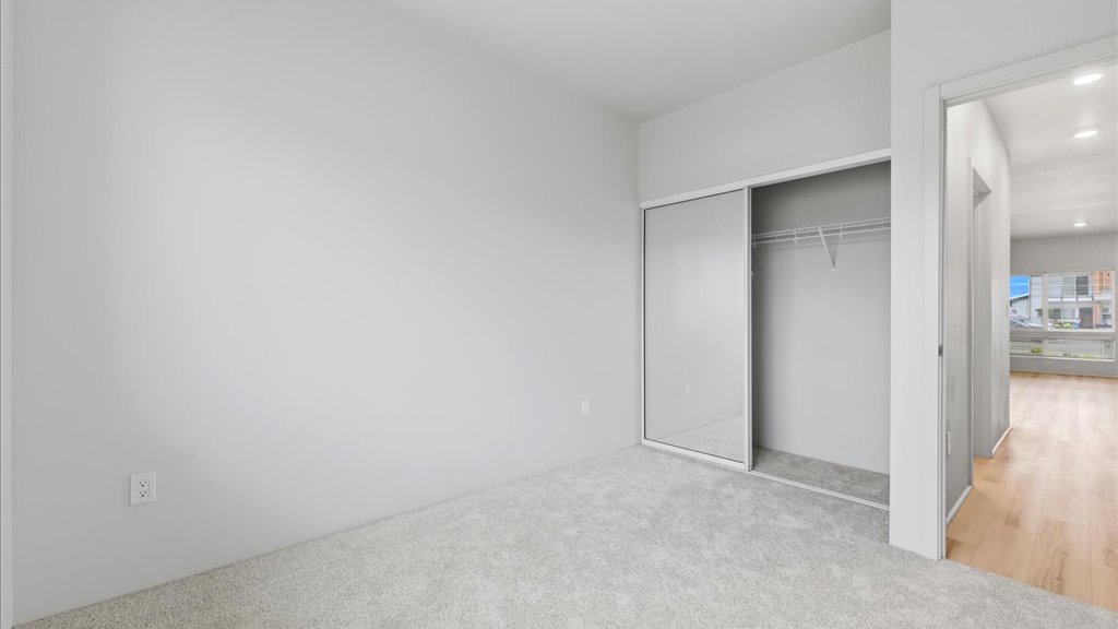 Interior bedroom with sliding door closet