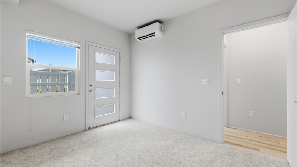 Interior bedroom with his and hers closet and bathroom