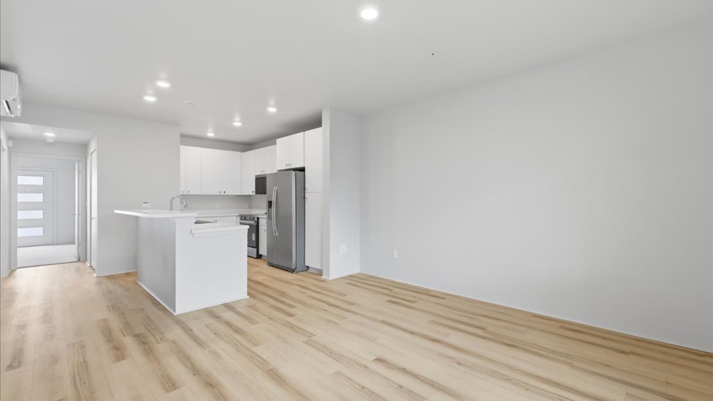 Interior living room open to kitchen