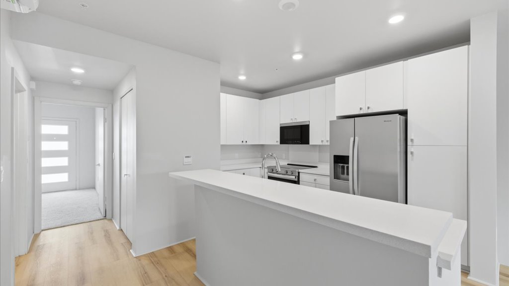Interior living room open to kitchen