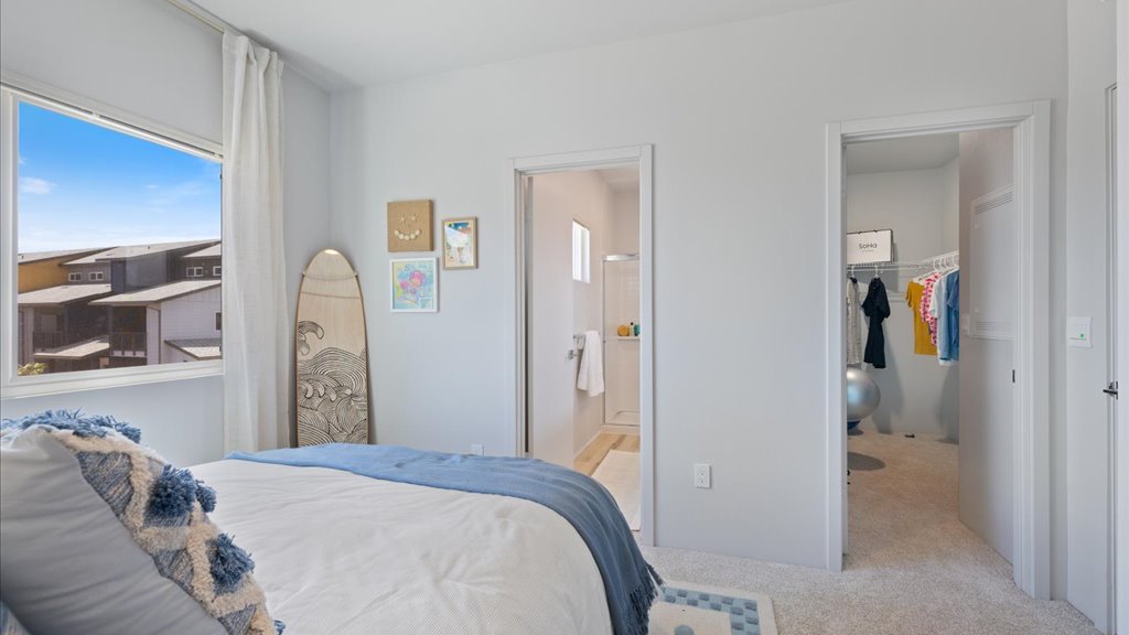 Interior bedroom with large window with walk in closet