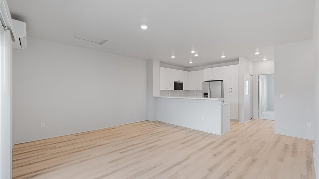 Interior kitchen open to living room