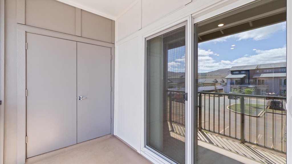 Exterior balcony lanai with sliding glass doors