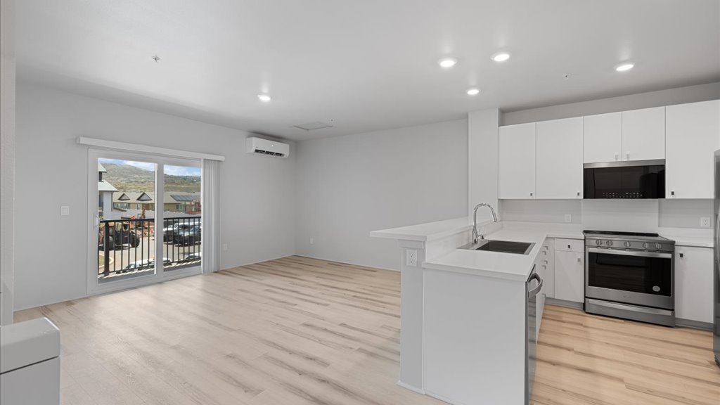Interior kitchen open to living room