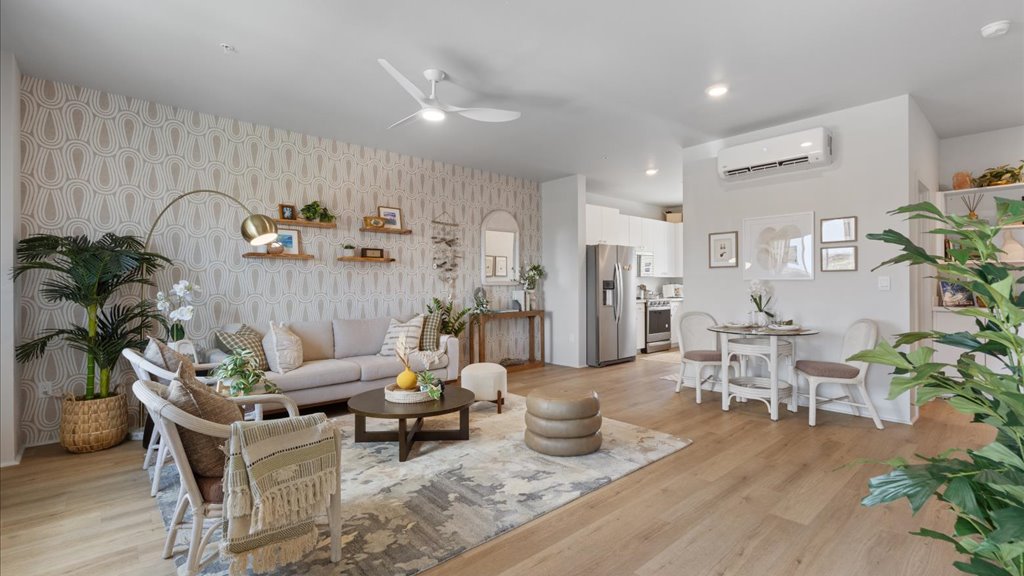 Interior living room that goes into the kitchen with dining area