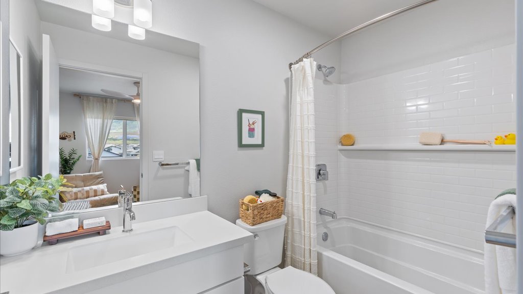 Interior bathroom with vanity sink toilet and shower
