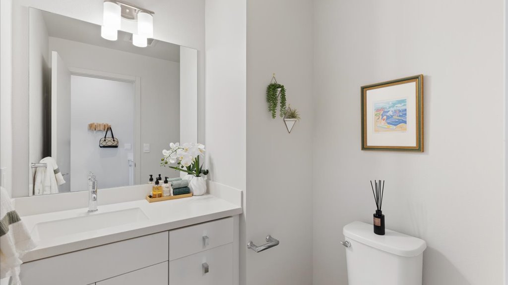 Interior powder bathroom with sink and toilet
