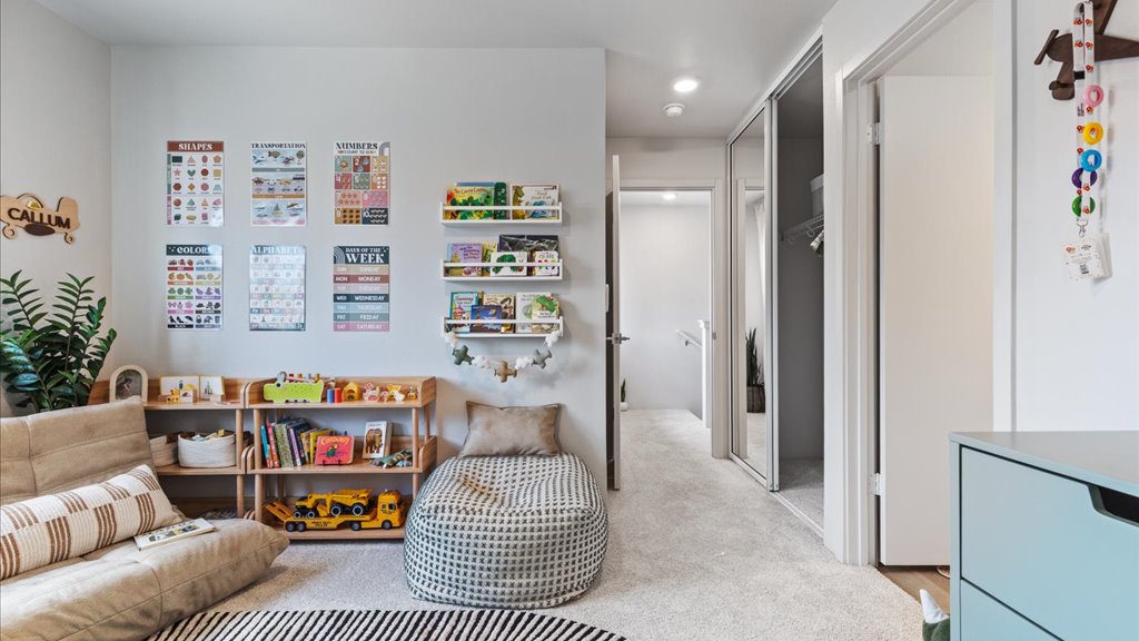 Interior bedroom with sliding door closet and ensuite bathroom