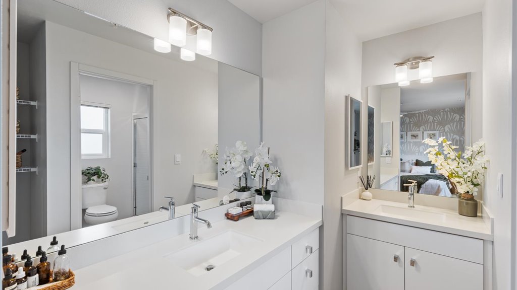 Interior bathroom with vanity sink toilet and walk in shower