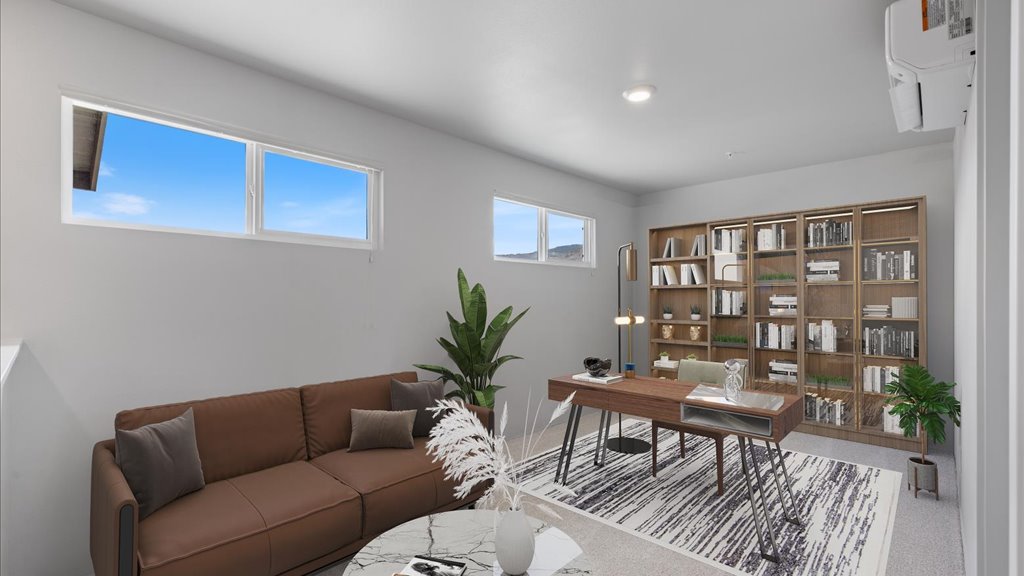 Interior flex office space with desk and couch