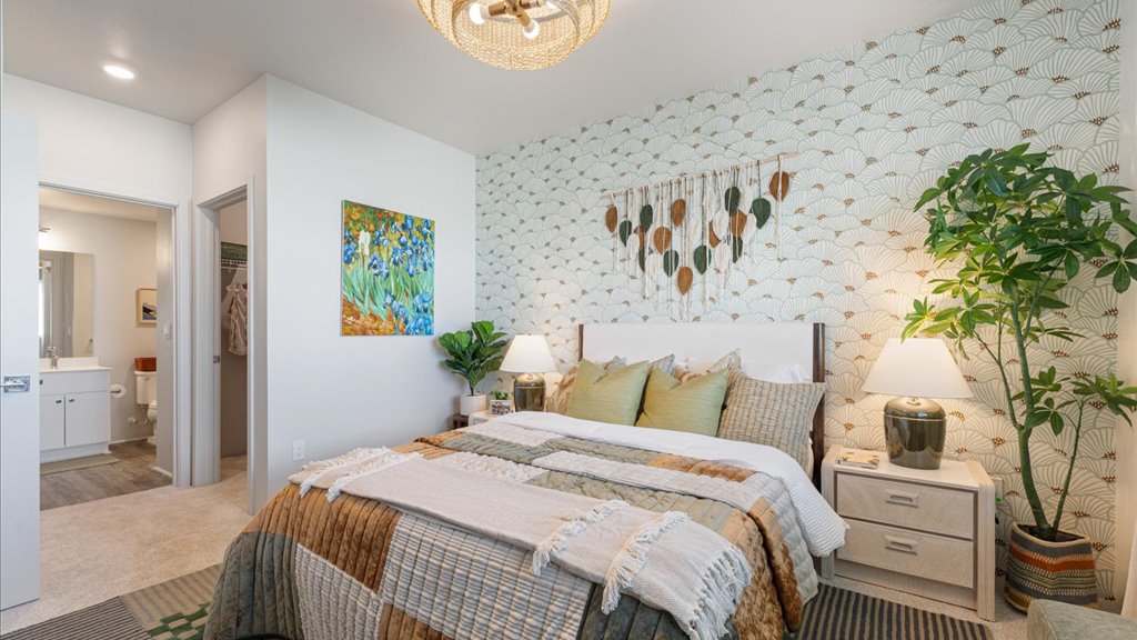 Interior bedroom open to bathroom