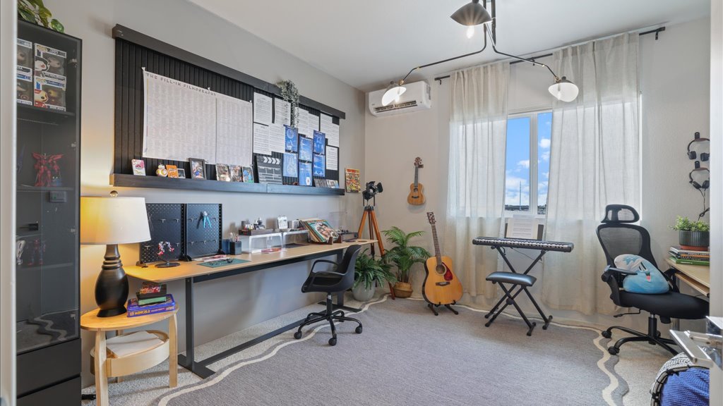 Interior bedroom/office with large window