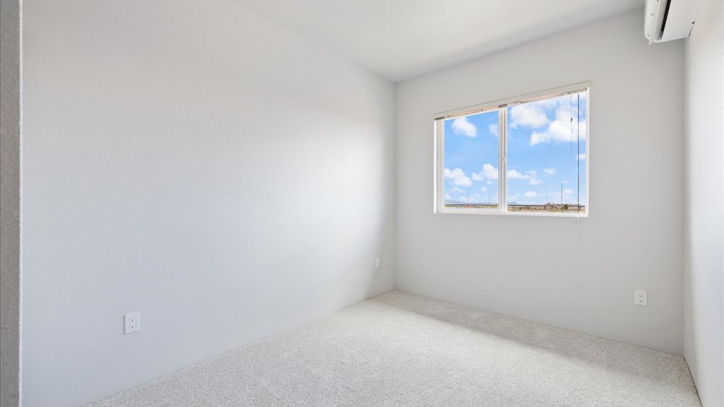 Interior bedroom with large window