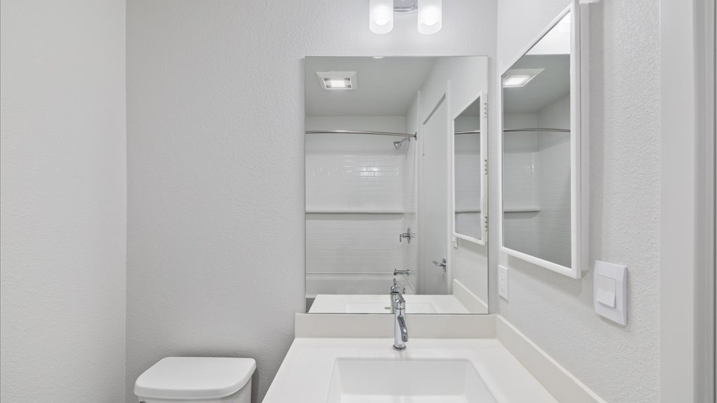 Interior bathroom with vanity toilet and shower