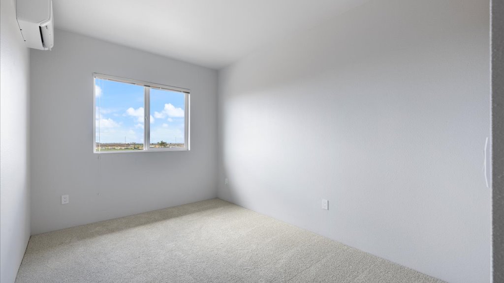 Interior bedroom with large window