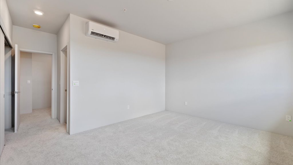 Interior bedroom with sliding closet doors