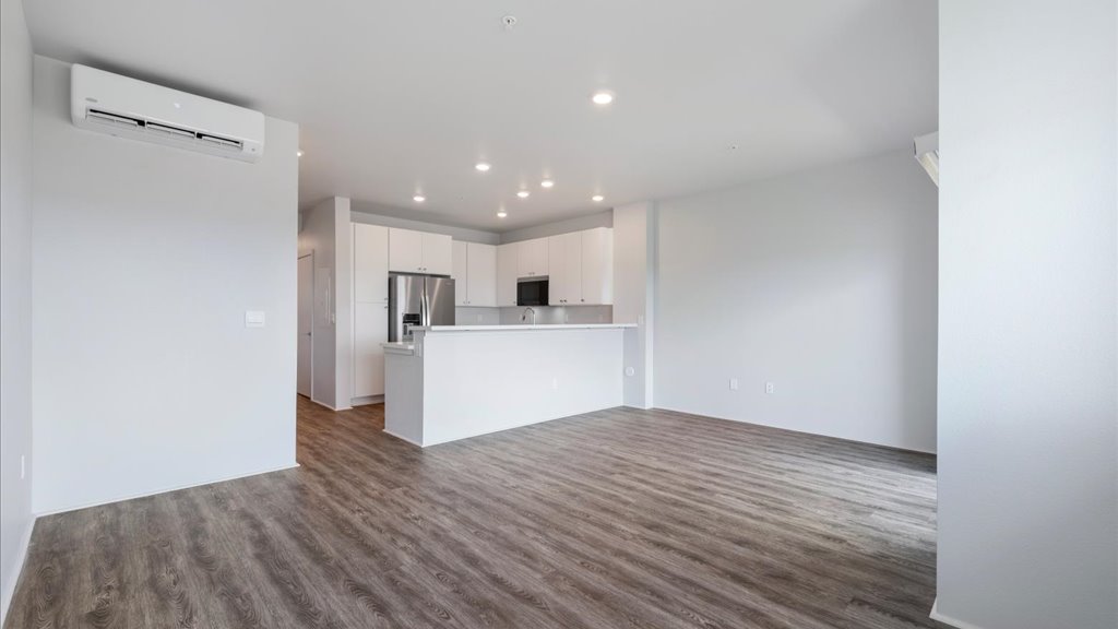 Interior living and dining room open to kitchen