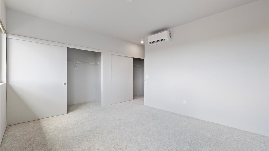 Interior bedroom with sliding door closet
