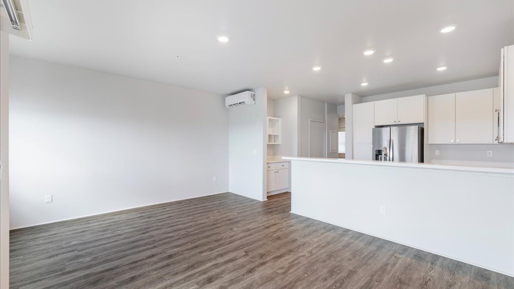 Interior living and dining room open to kitchen