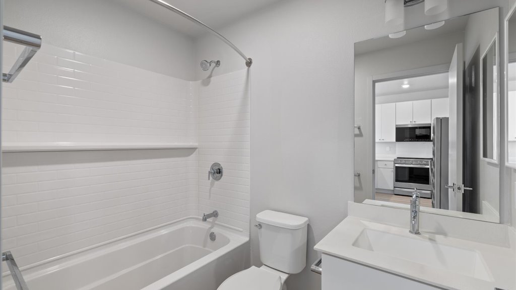 Interior bathroom with shower and bath combination