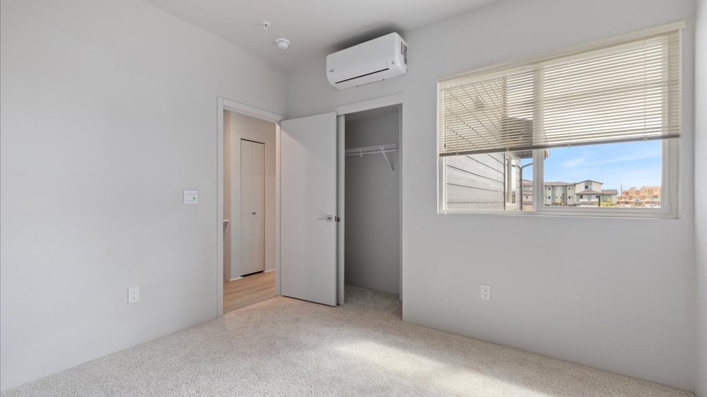 Interior bedroom with large window