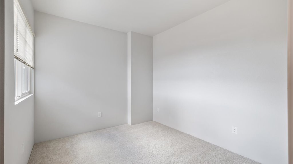 Interior bedroom with large window