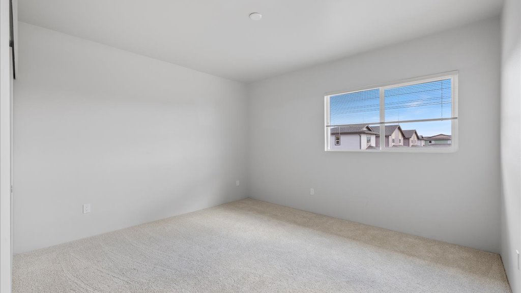 Interior bedroom with large window