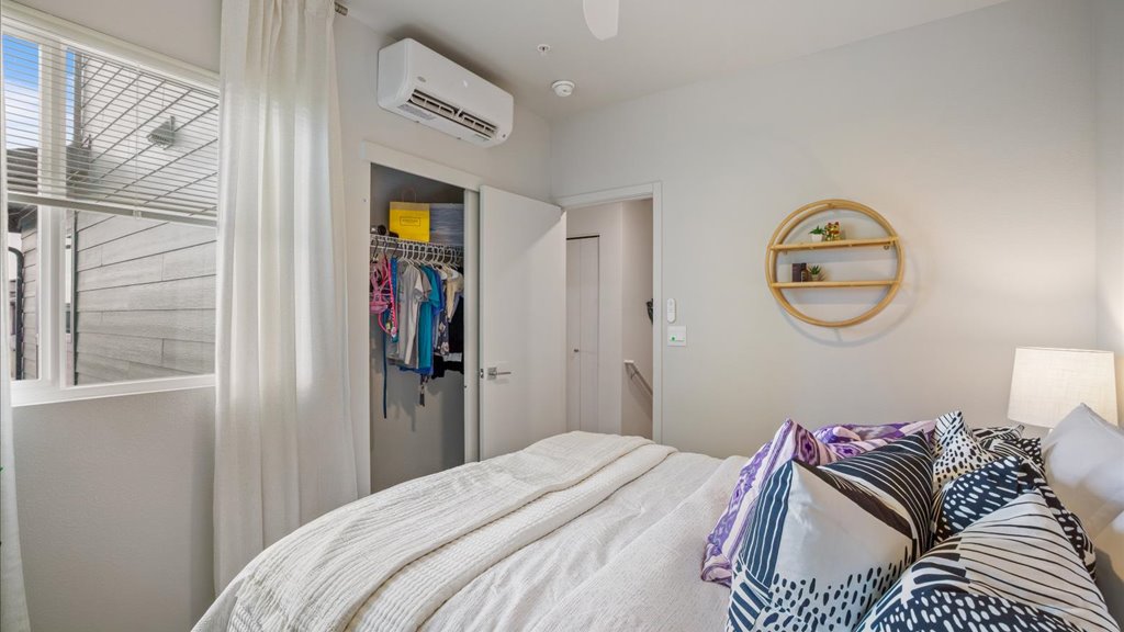 Interior bedroom with sliding closet doors