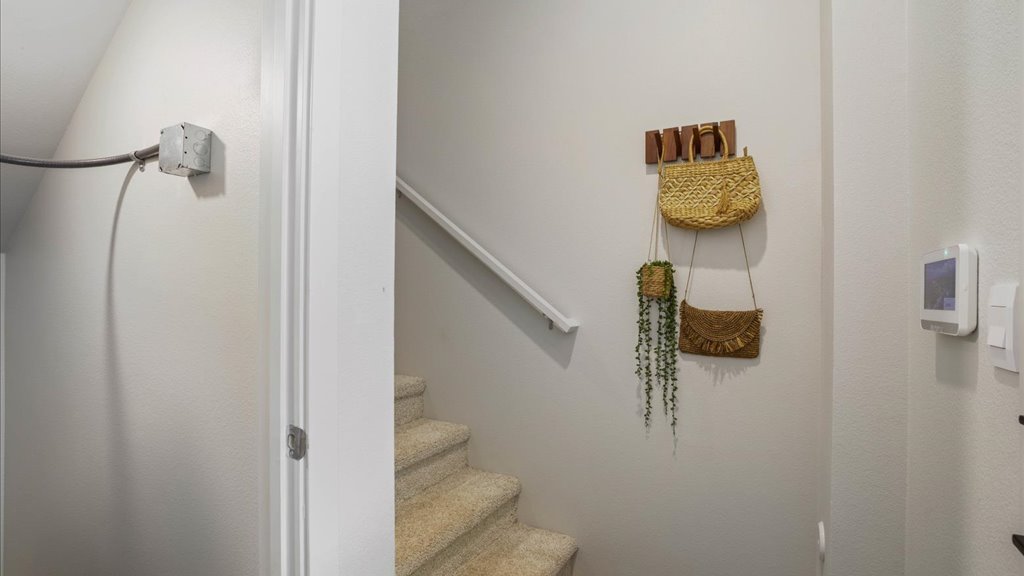 Interior hallway open to stairs