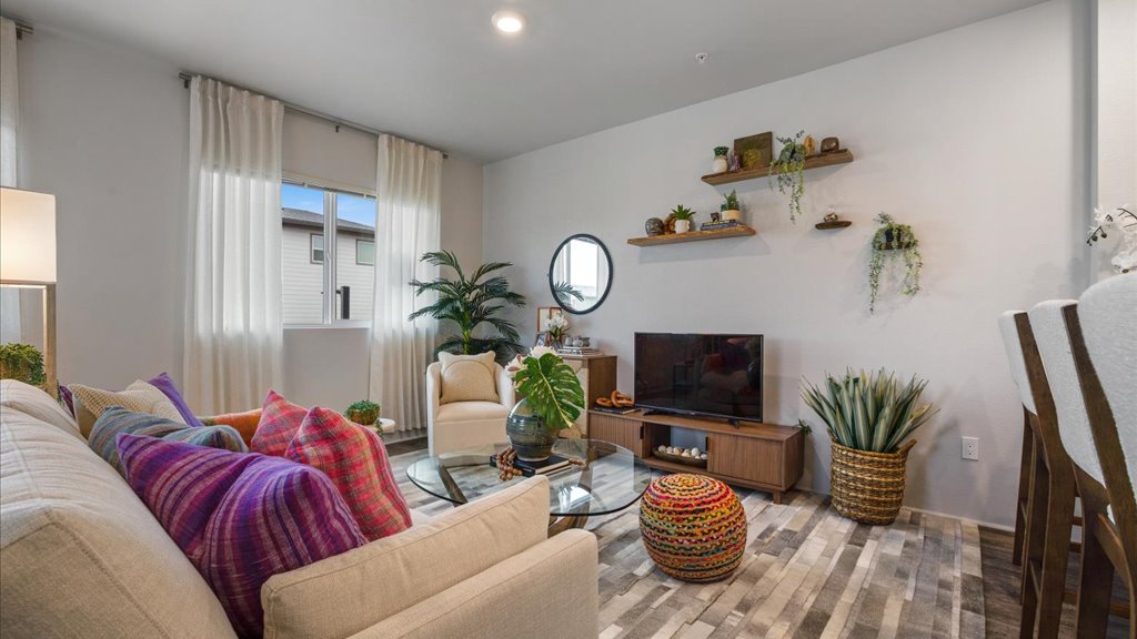 Interior living and dining room open to kitchen