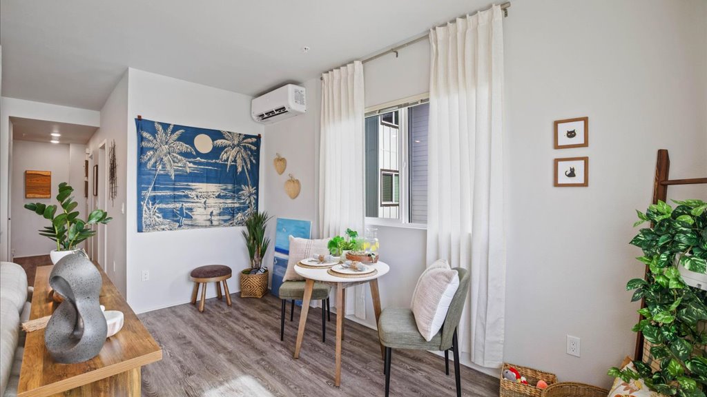 Interior living and dining room open to kitchen