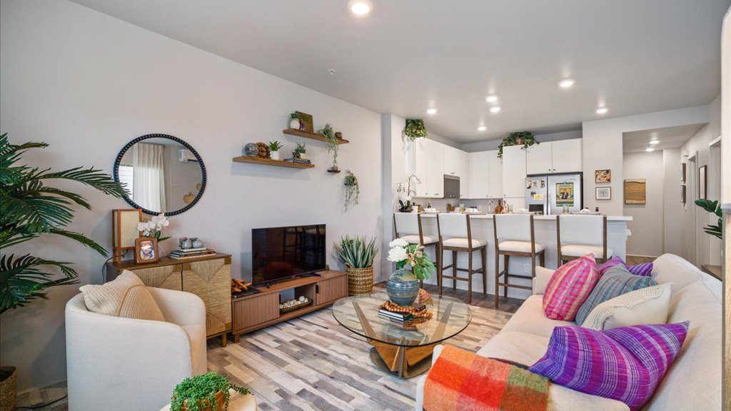 Interior living room and dining area open to kitchen