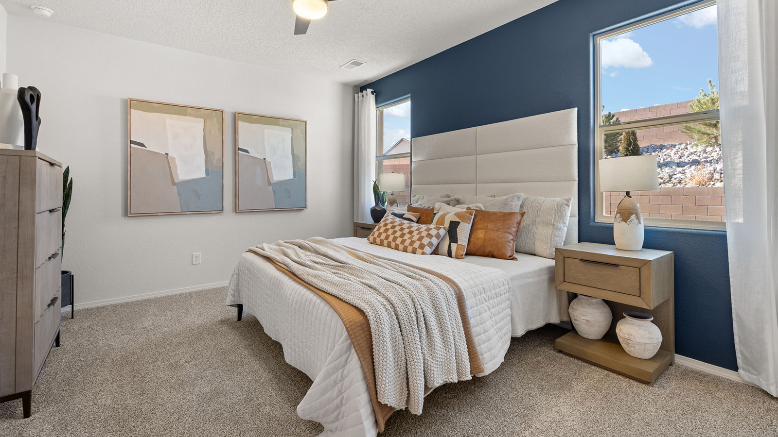 Primary bedroom designed with privacy and space in mind with a flow into a spa-inspired ensuite bathroom and walk-in closet