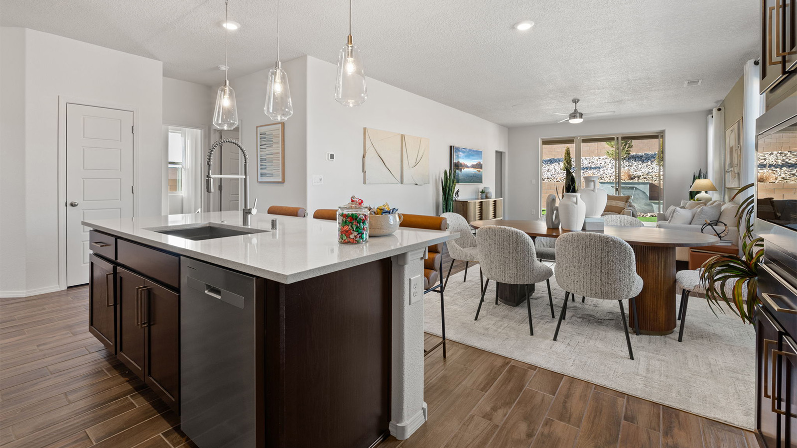 View from kitchen into the dining and living areas, backyard area, showing fresh open design at Sagrado