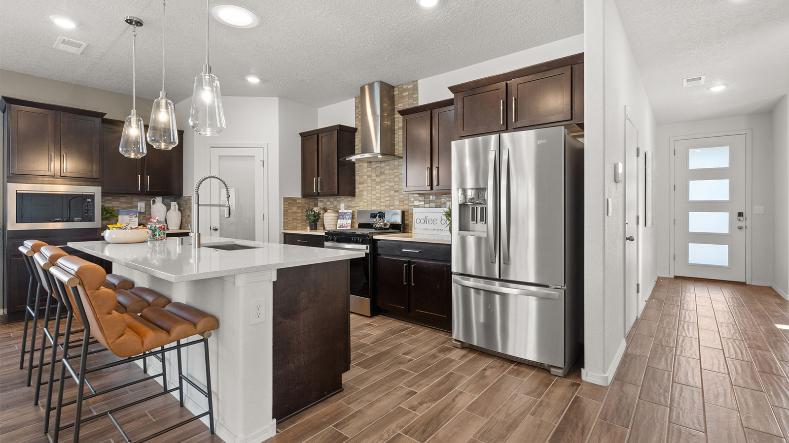 See our foyer, entry hall inside front door, next to flex-office, direct line of sight to kitchen, living and outside areas