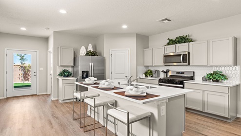 kitchen with island and gray cabinets