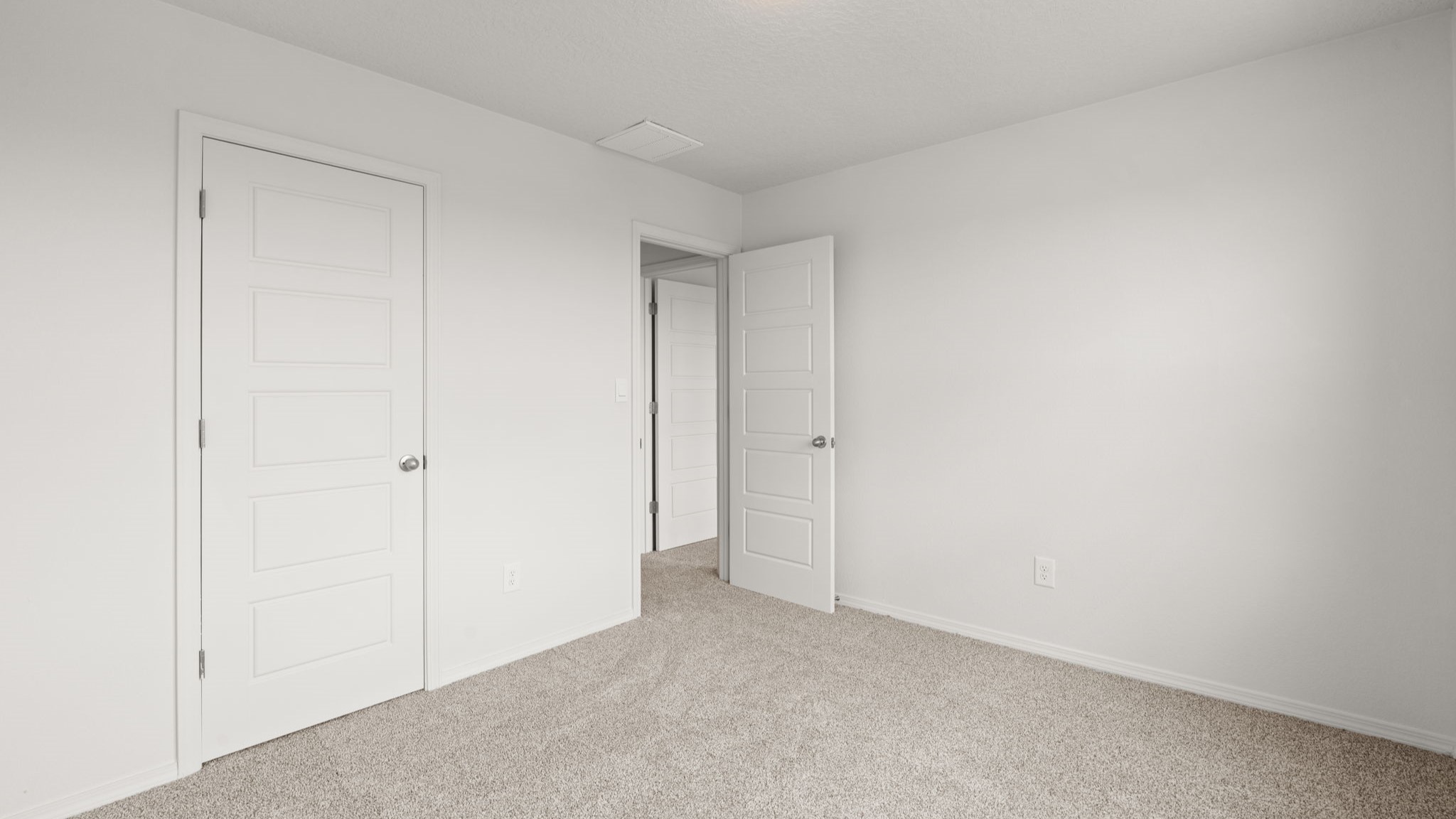 Upstairs Bedroom 4 with carpet, closet and two windows